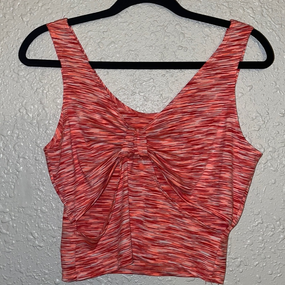 Pink tank top with openings